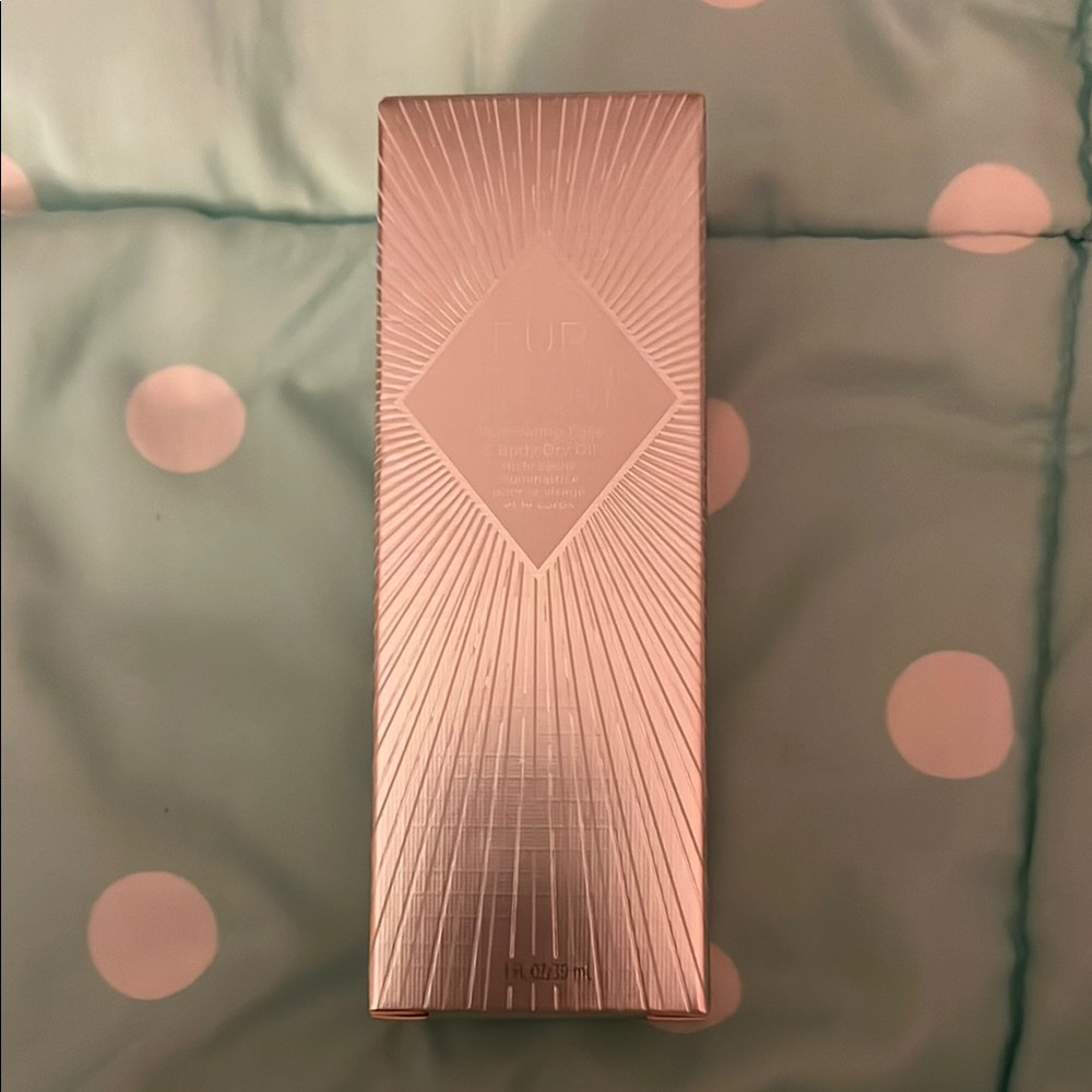 Pur Face and Body Dry Oil in Silver Packaging